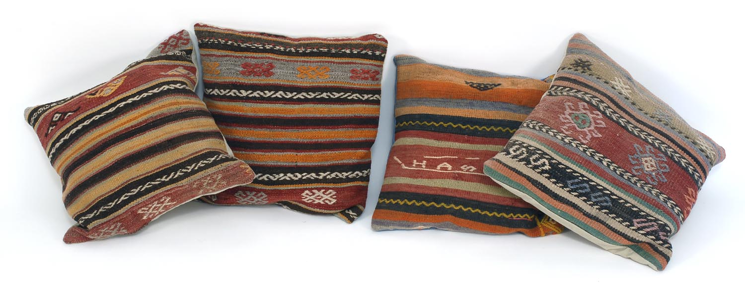 Appraisal: FOUR THROW PILLOWS made from Oriental rugs ConditionGood