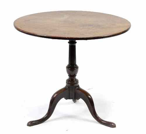 Appraisal: A George III mahogany table the circular top on column