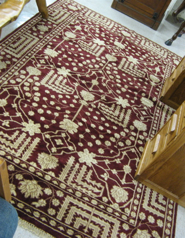 Appraisal: HAND KNOTTED ORIENTAL CARPET Indo-Persian overall floral tracery executed in