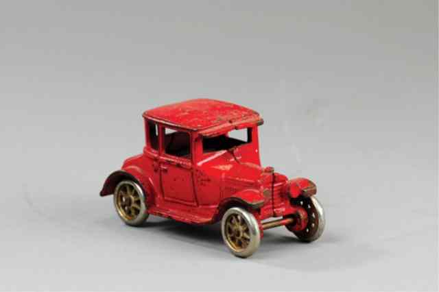 Appraisal: ARCADE MODEL 'T' COUPE Cast iron painted in red overall