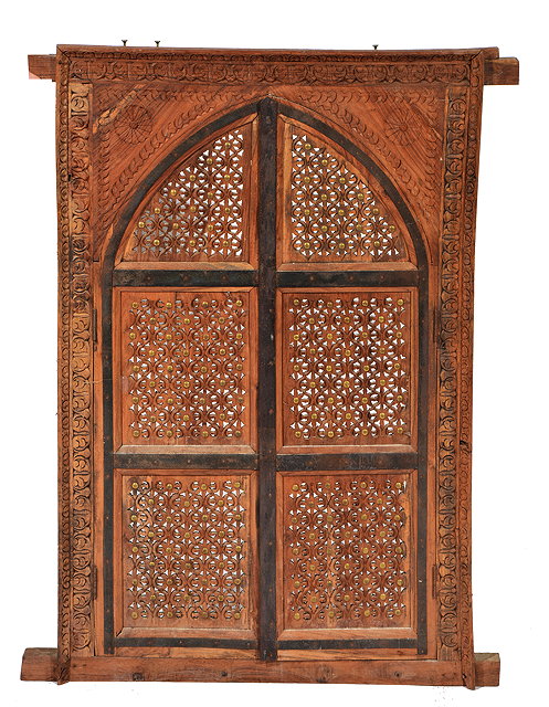 Appraisal: AN ORIENTAL HARDWOOD PIERCED AND CARVED IRON MOUNTED WINDOW flower