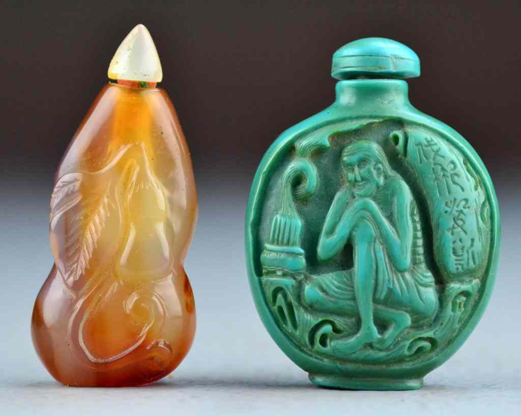 Appraisal: Chinese Carved Snuff BottlesTo include a lavender agate terminating to