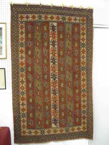 Appraisal: Kazak Persian Handmade Rug rows of geometric designs ' ''