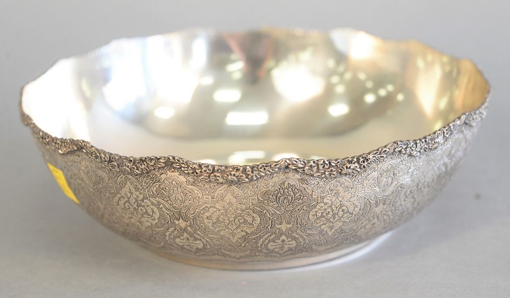 Appraisal: Large silver Persian bowl elaborately chase decorated with floral rim