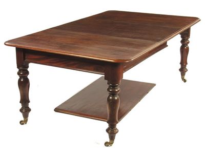 Appraisal: A Victorian mahogany extending dining table the moulded edge top