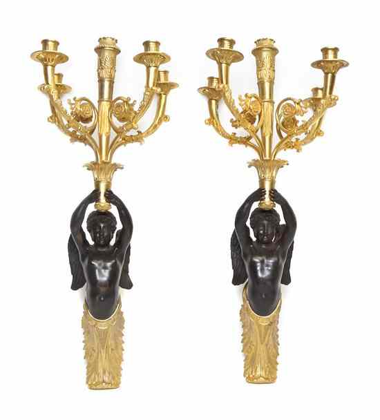 Appraisal: A Pair of Continental Gilt and Patinated Bronze Five-Light Figural