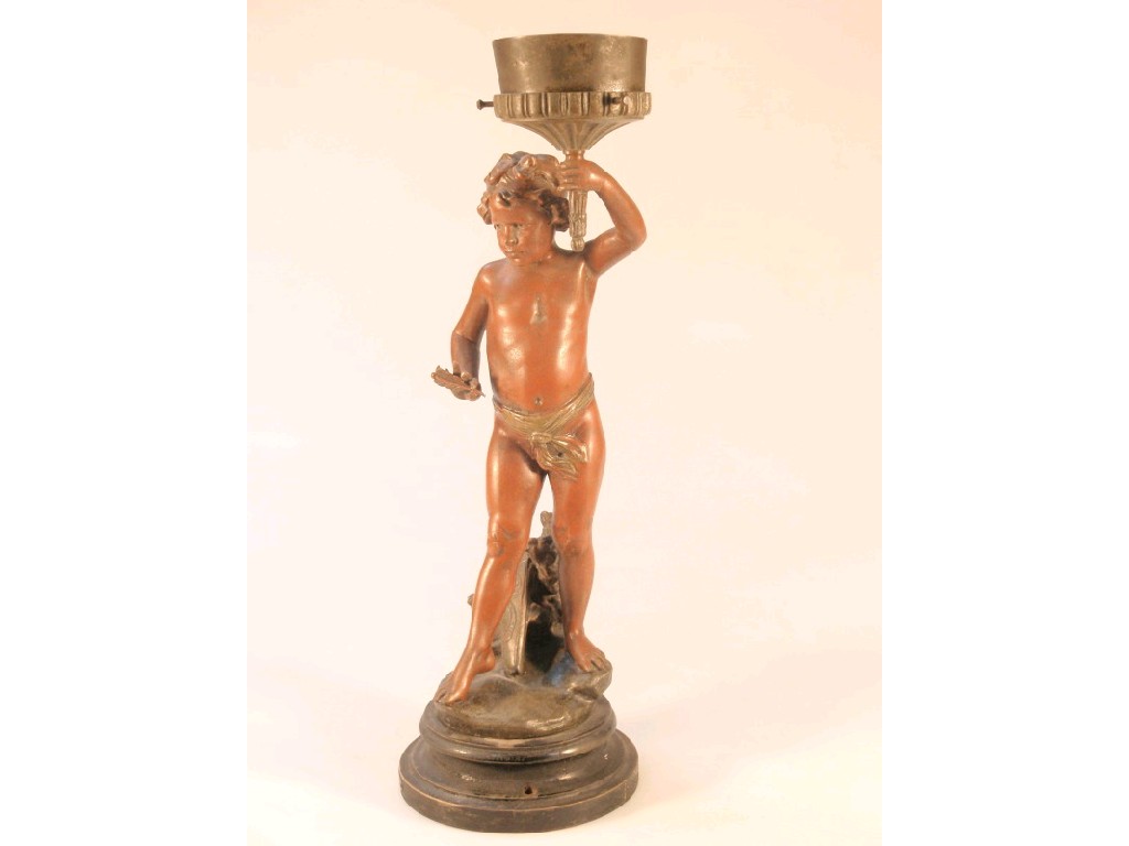 Appraisal: A thC spelter lamp base modelled as a young boy