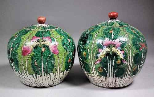 Appraisal: Two similar Chinese porcelain globular shaped pots and covers enamelled