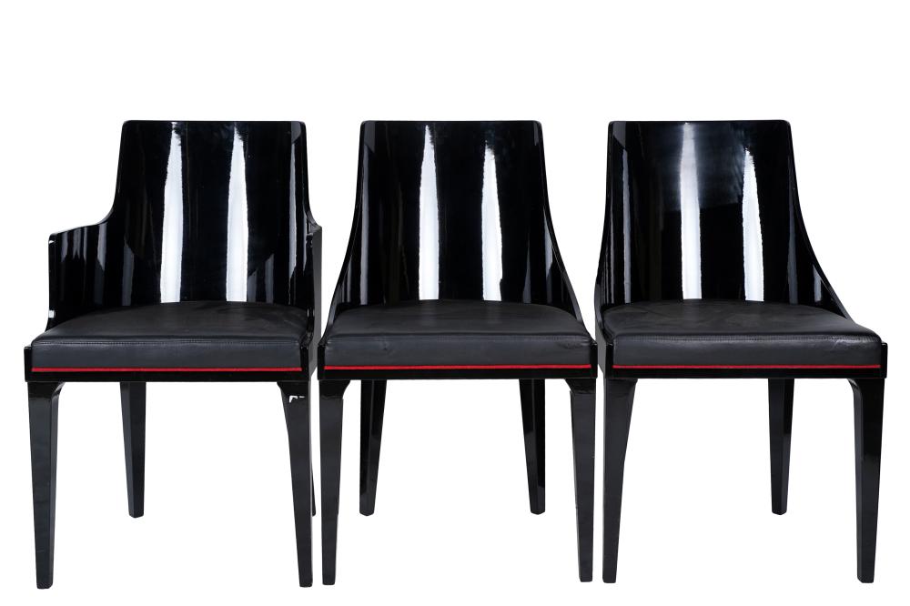 Appraisal: THREE ROCHE BOBOIS DINING CHAIRSblack-lacquered wood with black leatherette seats