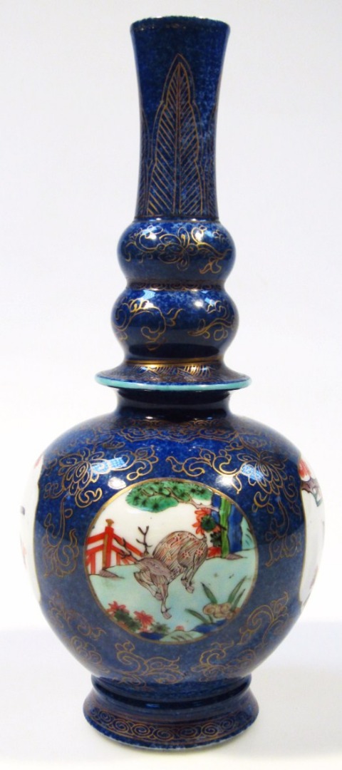 Appraisal: A Chinese Kangxi porcelain double gourd vase with shaped part