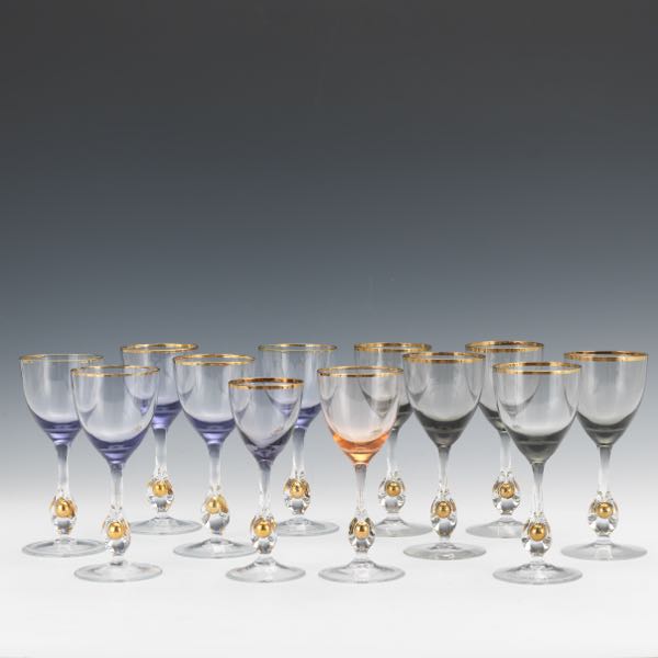 Appraisal: CRYSTAL WINE GLASSES SET OF TWELVE Twelve blown wine glasses