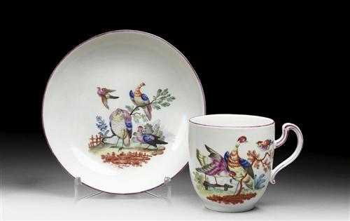 Appraisal: CUP AND SAUCER WITH BIRD DECORATION probably H chst circa