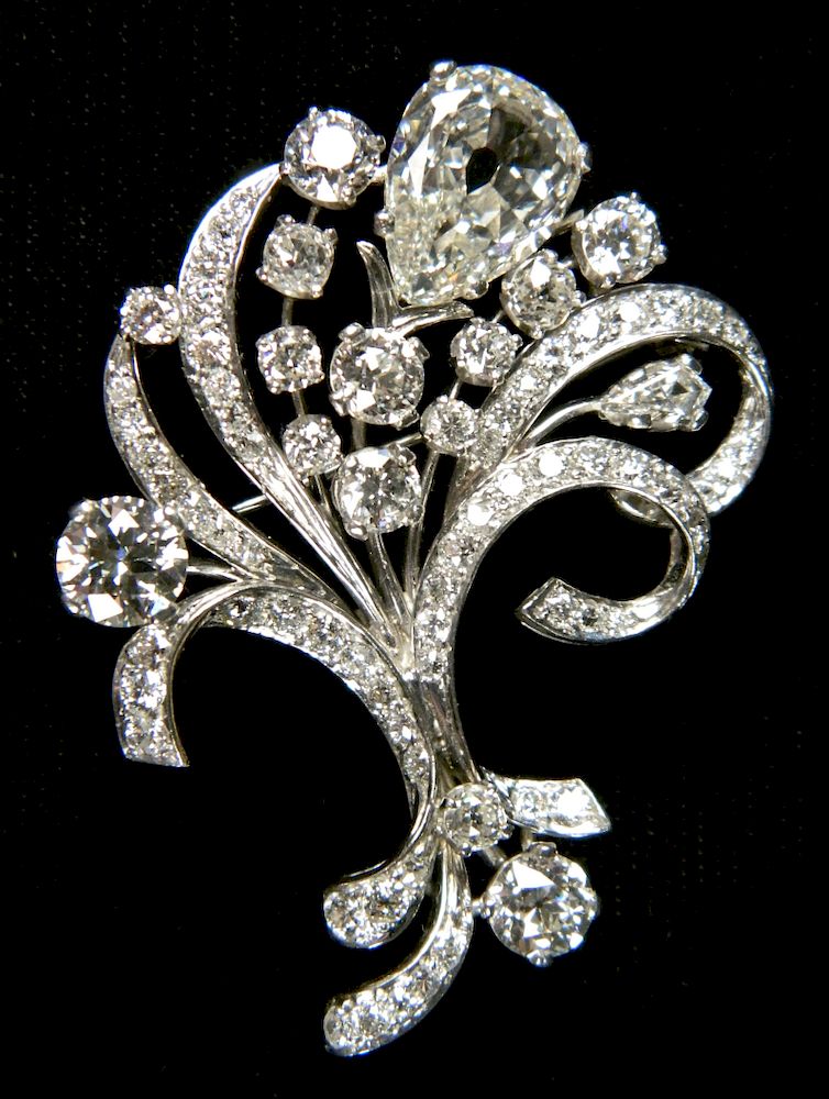 Appraisal: Platinum and diamond brooch One stamped platinum diamond brooch- It