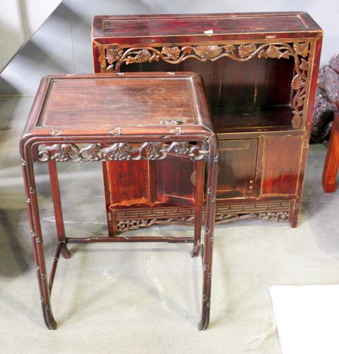 Appraisal: A Chinese carved hardwood open side cabinet together with a