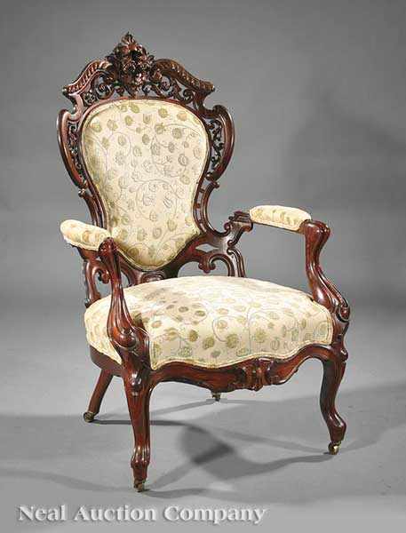 Appraisal: An American Rococo Carved and Laminated Rosewood Armchair mid- th