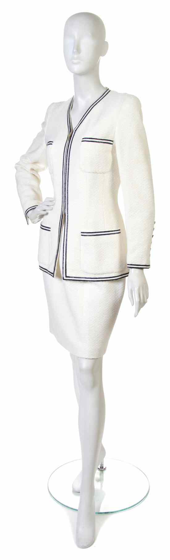 Appraisal: A Chanel Cream Two Piece Skirt Suit with navy trim