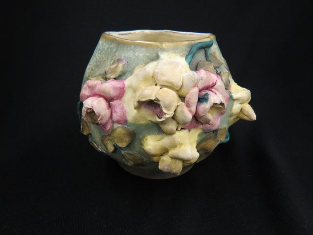 Appraisal: Amphora Pottery Vase raised floral design iridescent glaze tall