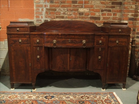 Appraisal: NEW YORK SHERATON MAHOGANY SIDEBOARD Circa 's The shaped rectangular