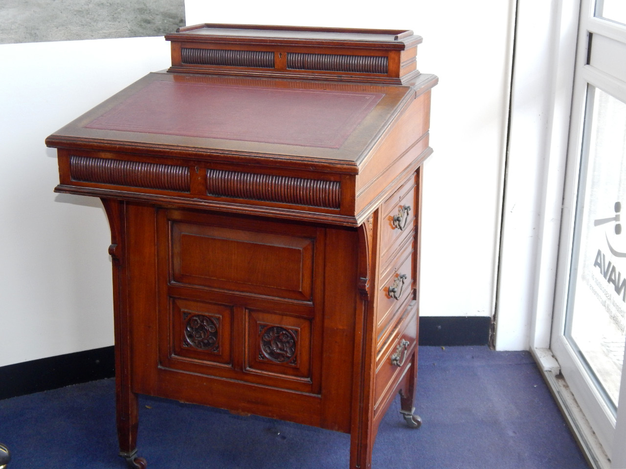 Appraisal: A Victorian oak Davenport the stationery compartment top above a