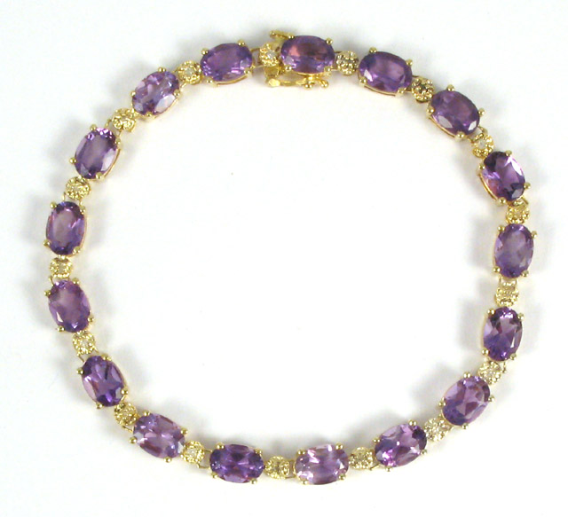 Appraisal: AMETHYST DIAMOND AND YELLOW GOLD BRACELET - in length and