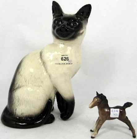 Appraisal: Beswick Fireside Siamese Cat And Small Stretched Brown Foal