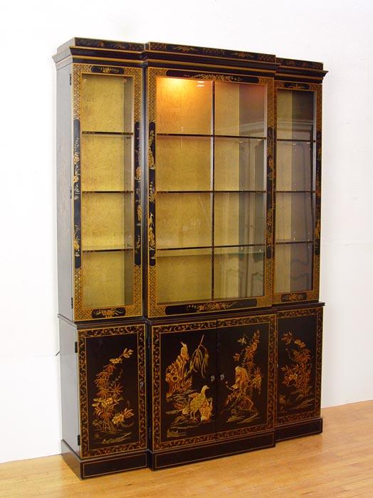 Appraisal: DREXEL CHINOISERIE DECORATED CHINA CABINET Gold decoration on black ground