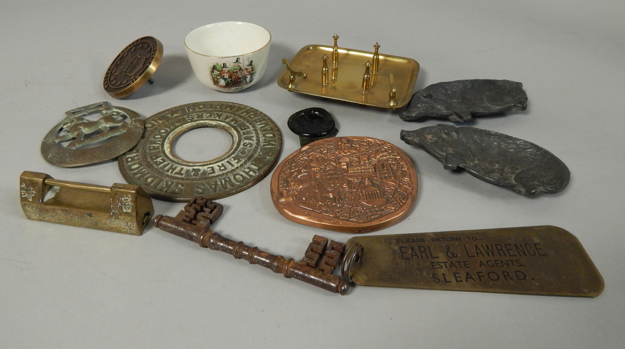 Appraisal: A quantity of metal ware to include a pair of