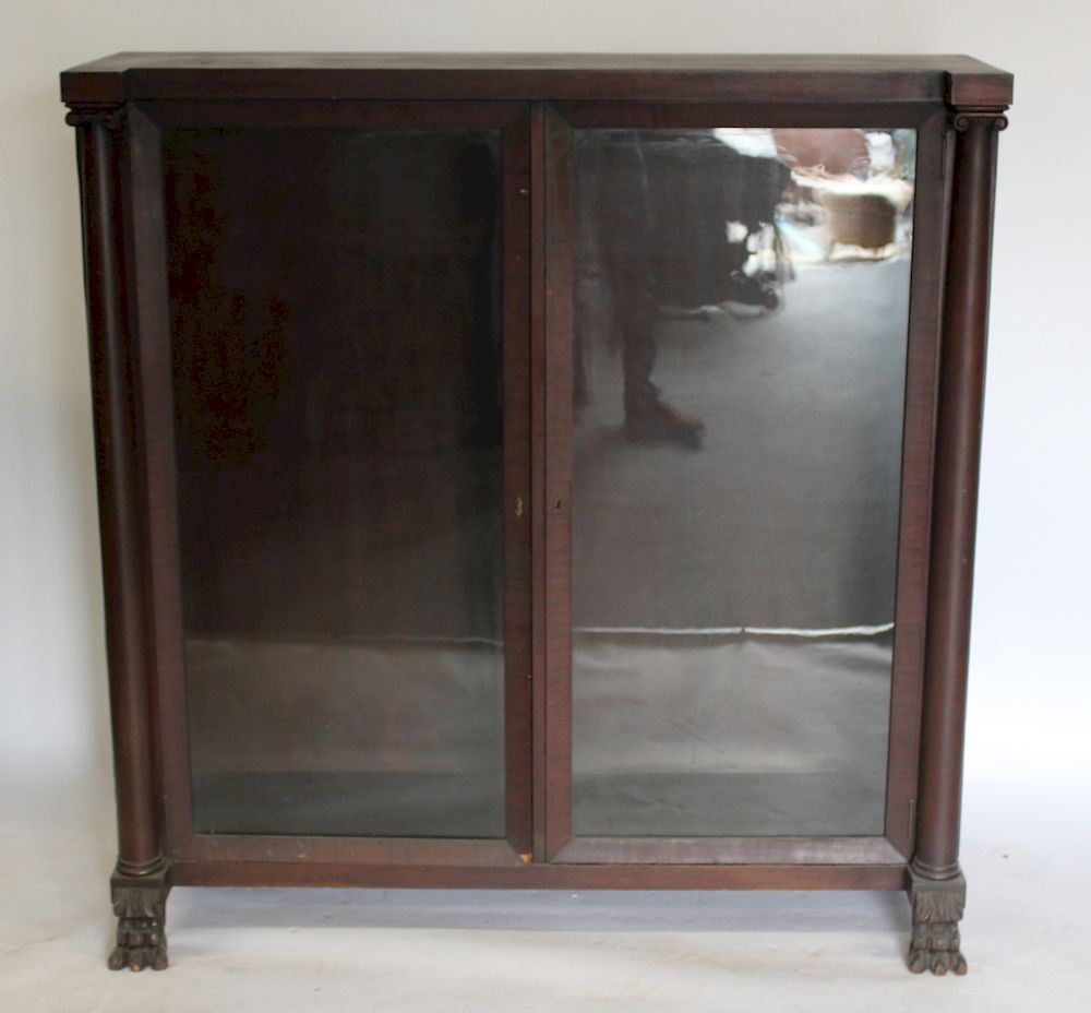 Appraisal: Empire Mahogany Bookcase with Doors and Claw Feet RJ Horner