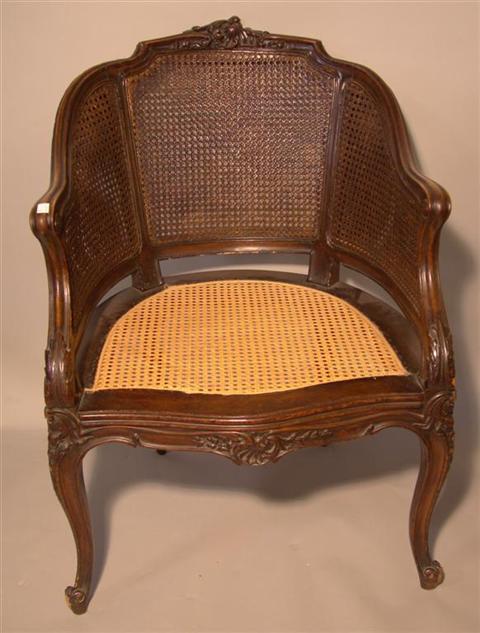 Appraisal: LOUIS XV STYLE CANED MAHOGANY BERGERE th century the foliate