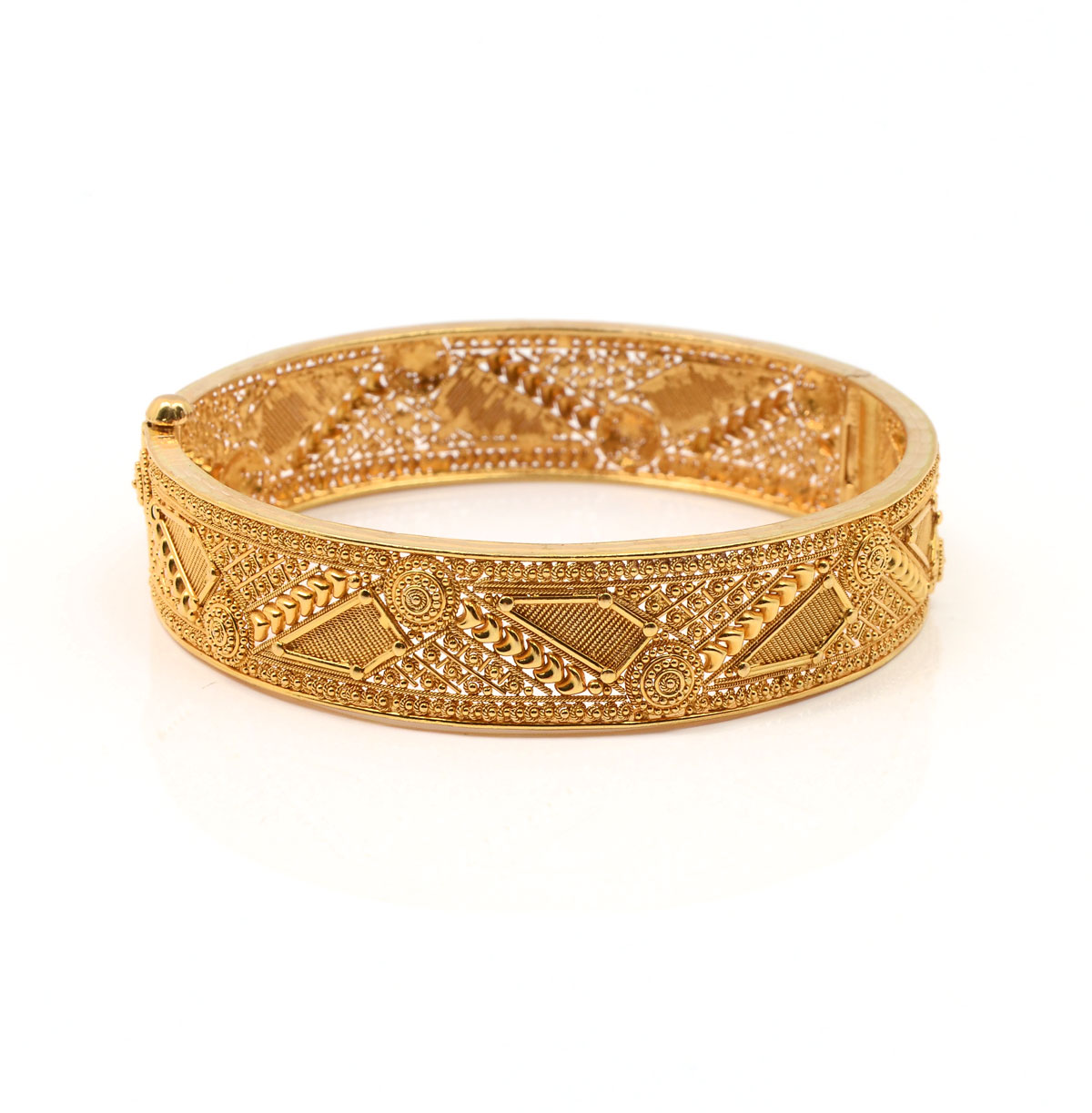 Appraisal: GRAM K ETRUSCAN BANGLE Beautifully detailed K bangle is washed