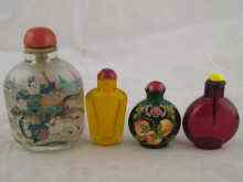 Appraisal: Four glass Chinese snuff bottles