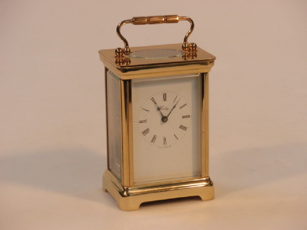 Appraisal: A gilt brass carriage clock with timepiece movement the white