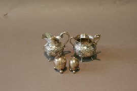 Appraisal: A continental sugar bowl with tongs together with a continental