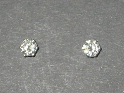 Appraisal: A PAIR OF DIAMOND STUD EARRINGS the brilliant cut diamonds