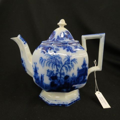 Appraisal: Flow Blue Ironstone Scinde Teapot octagon panel pumpkin shape pedestal