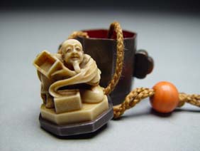 Appraisal: CARVED LACQUER NETSUKE Unusual and extremely well formed lacquer netsuke