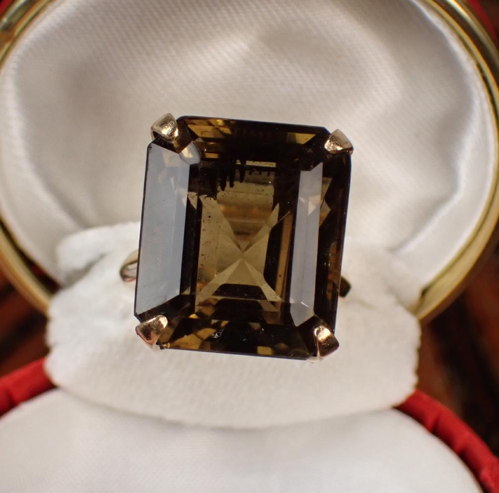 Appraisal: SMOKY QUARTZ AND FOURTEEN KARAT GOLD RING with four k