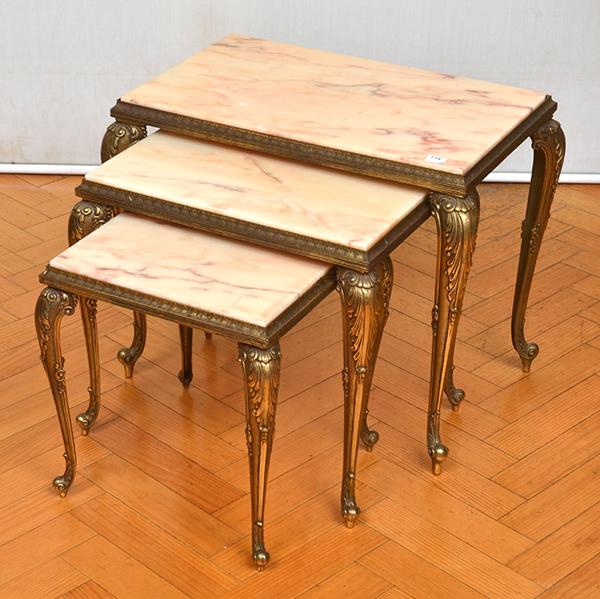 Appraisal: A NEST OF THREE GILT METAL BASED RECTANGULAR SIDE TABLE