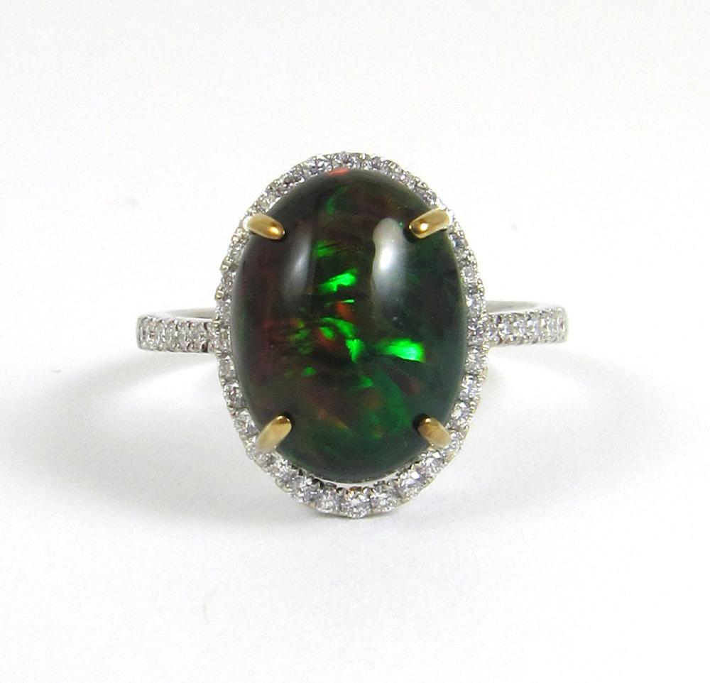 Appraisal: BLACK OPAL DIAMOND AND FOURTEEN KARAT WHITE GOLD RING with