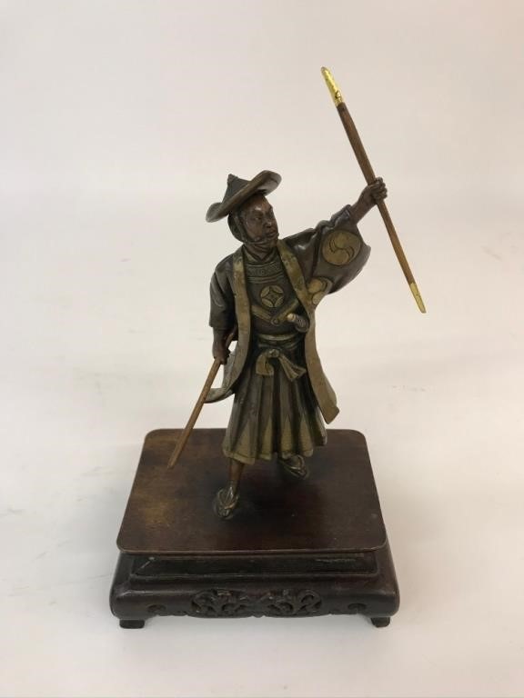 Appraisal: Asian bronze warrior sculpture mounted on a wood base probably