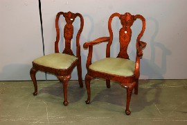 Appraisal: A set of six dining chairs including two carvers by