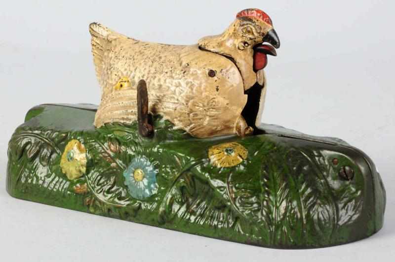 Appraisal: Cast Iron Hen Chick Mechanical Bank Manufactured by J E