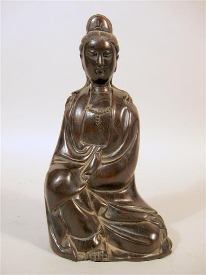 Appraisal: Chinese hardwood Quanyin Qing dynasty Carved to depict the subject