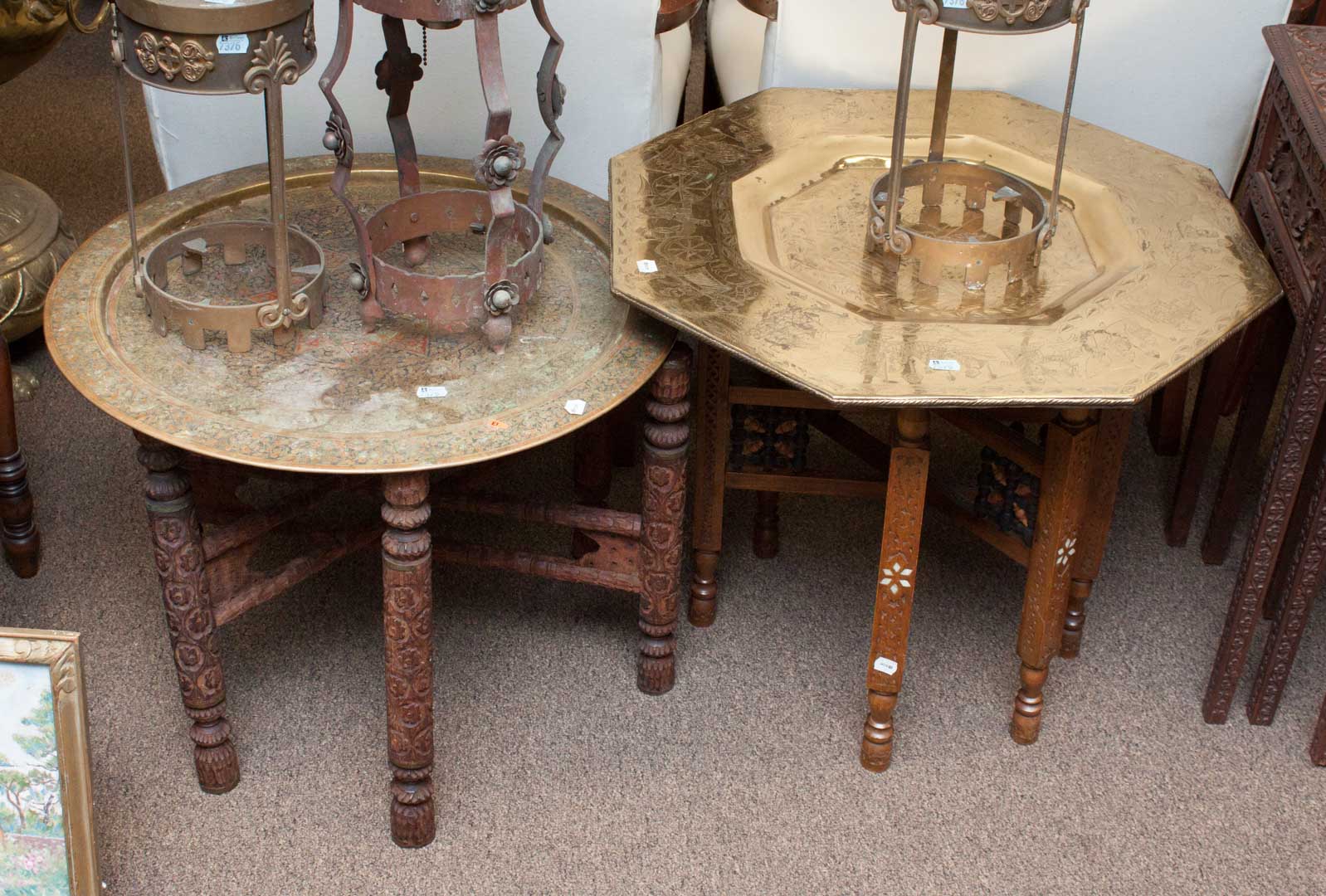 Appraisal: Two Indian brass top folding tables