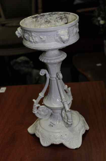 Appraisal: A TH CENTURY WHITE PAINTED SPELTER STAND with scrolling acanthus