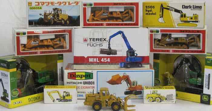 Appraisal: TWELVE DIECAST SCALE MODELS including Ertl John Deere K Tracked