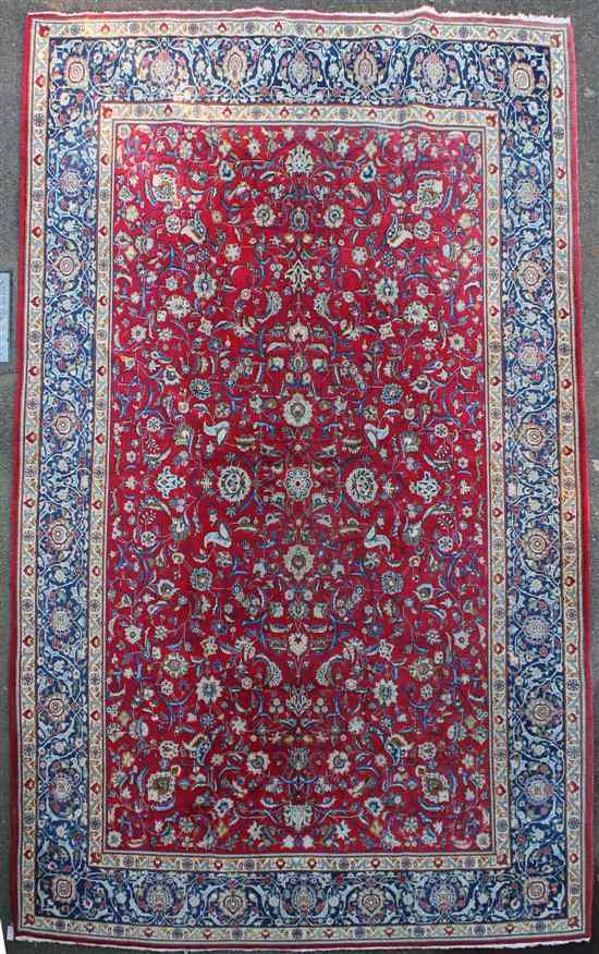 Appraisal: A Kashan carpet with field of scrolling foliage on a