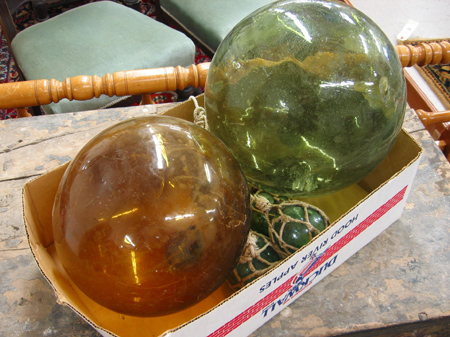 Appraisal: A GROUP OF COLORED GLASS FISHING FLOATS total Two are