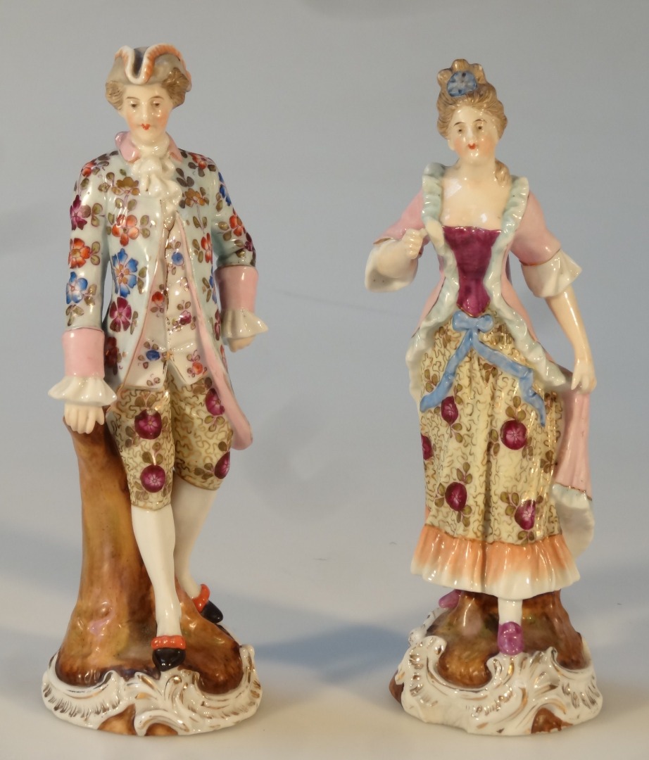 Appraisal: A pair of thC Sitzendorf porcelain figures of a lady