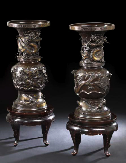 Appraisal: Pair of Japanese Bronze Dragon and Phoenix Vases Meiji period